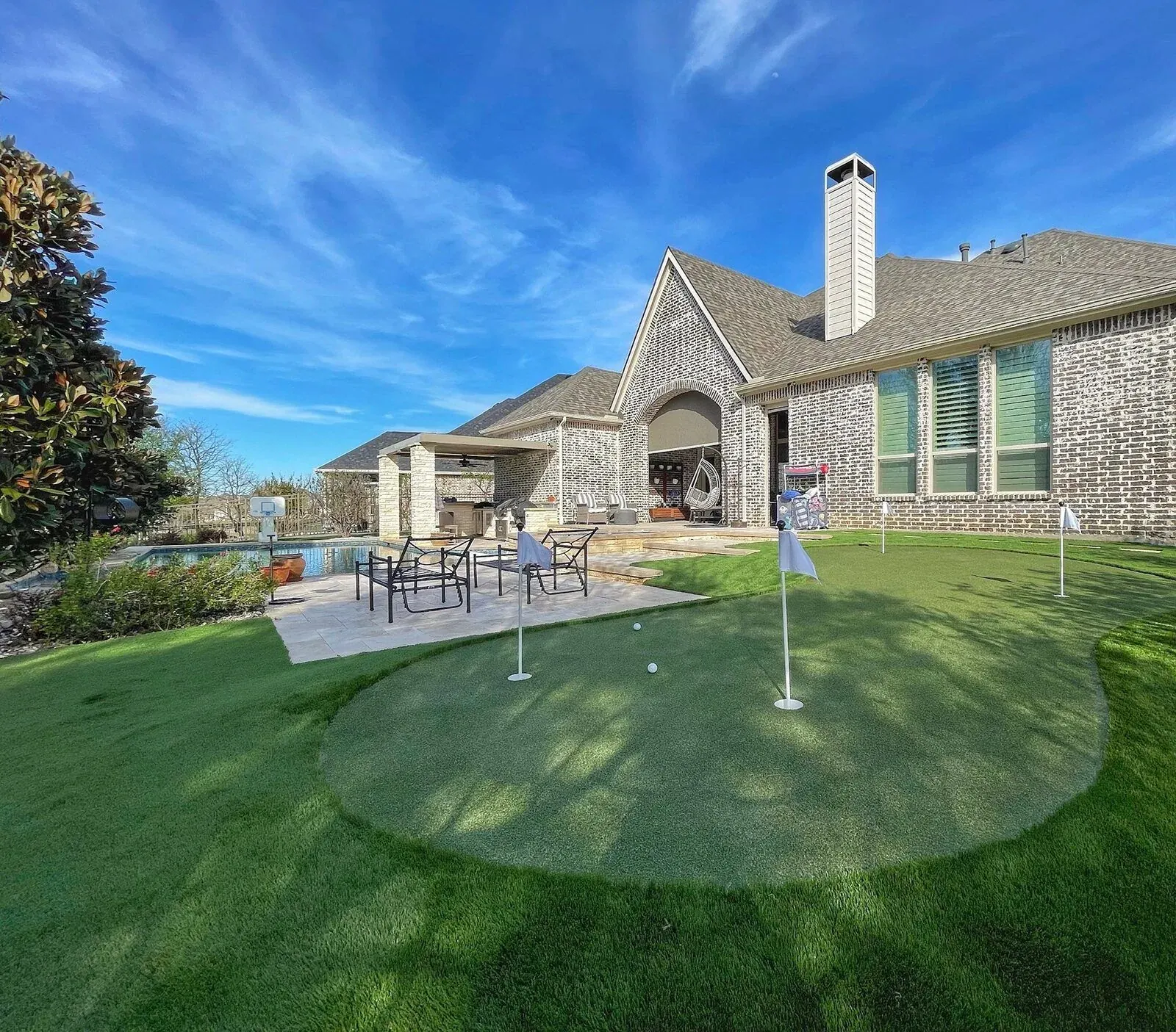 Completed residential putting green installation by Diamond Field Systems
